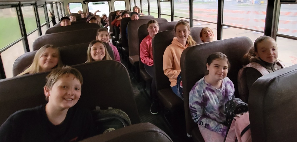 kids on bus for field trip