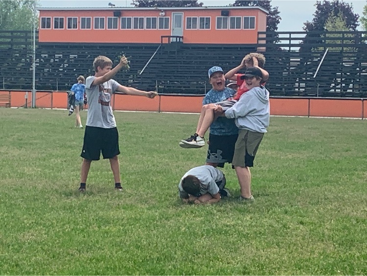 boys trying to make a cheer pyramid